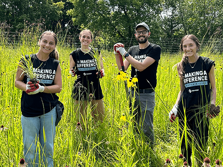 Oshkosh Corporation team members volunteering outside