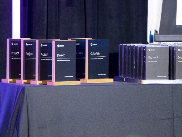 2025 Oshkosh Excellence awards displayed on a table