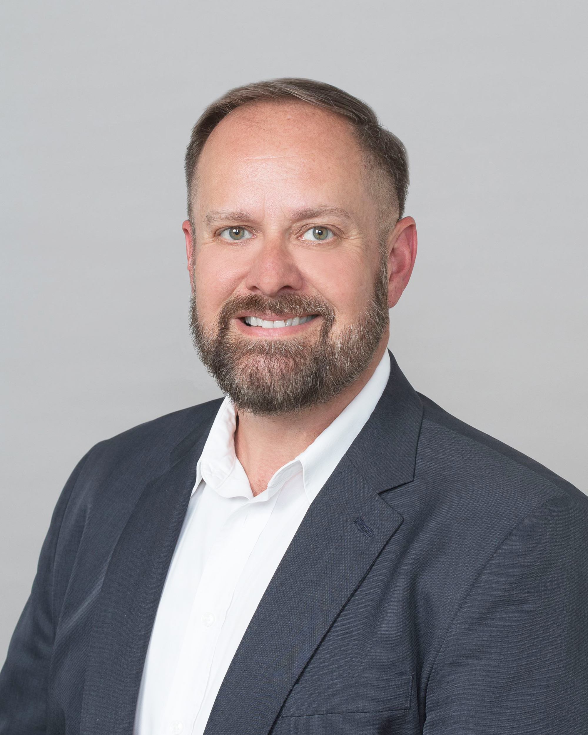 Professional headshot of Dave Smith, an Oshkosh Corporation technical fellow