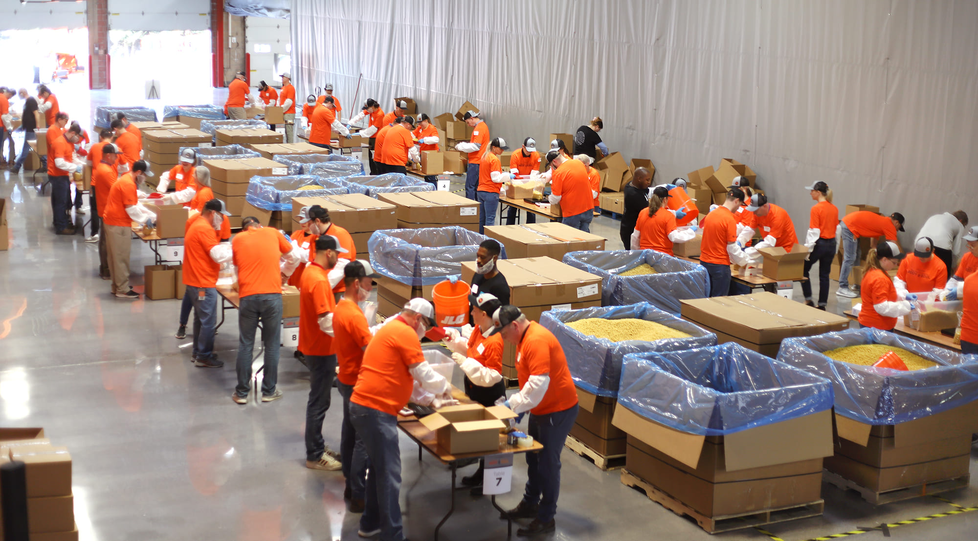 Group of JLG volunteers at the 2024 Feed the Body, Feed the Soul packing event in Hagerstown