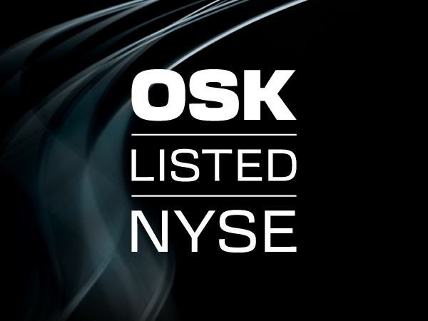 OSK AT NYSE black textured background
