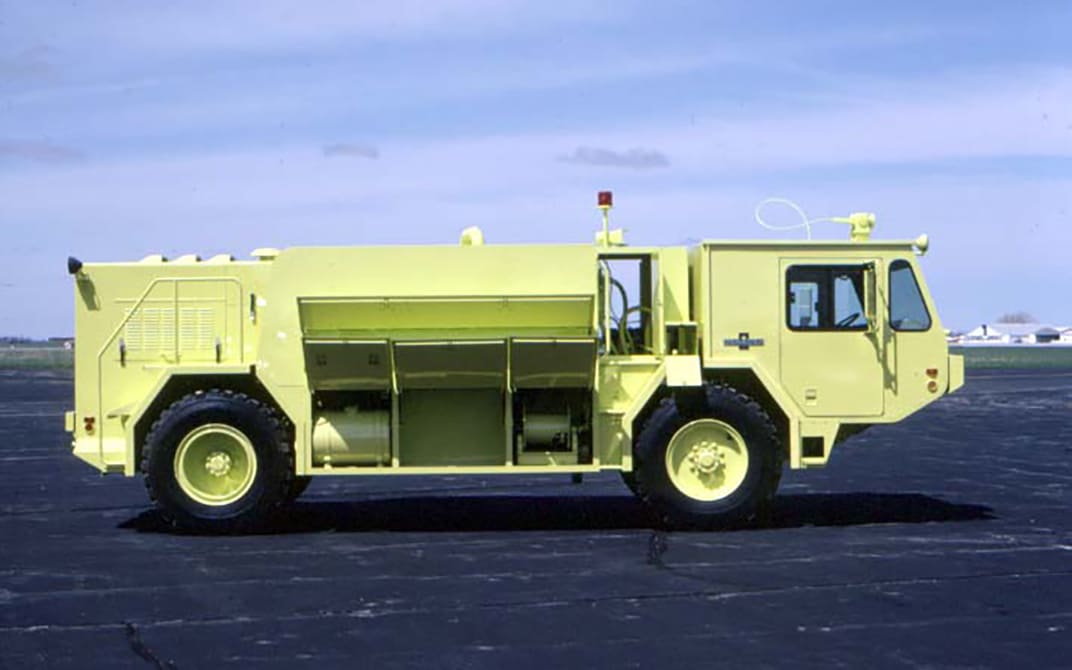 Yellow historical Oshkosh MB-5 truck 